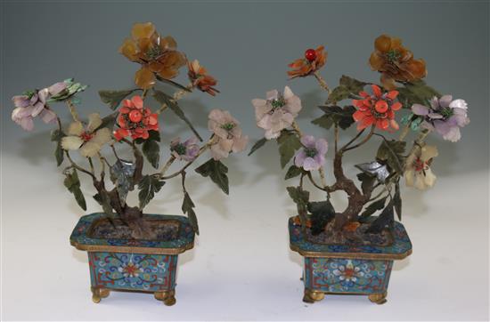 A pair of Chinese hardstone and coral mounted models of trees in cloisonné enamel jardinieres, early 20th century, 30cm, some losses